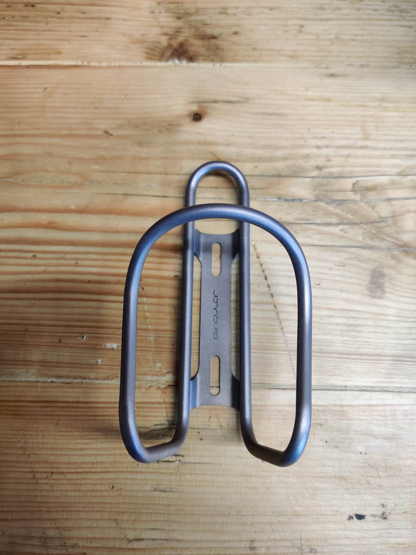 Singular Ti bottle cage